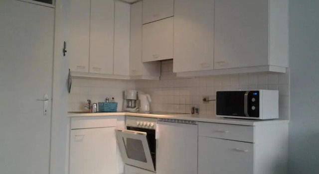 Апартаменты Zonnig Appartement met Zeezicht