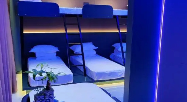 Кровать в общем номере Huihai E-Sports Hotel