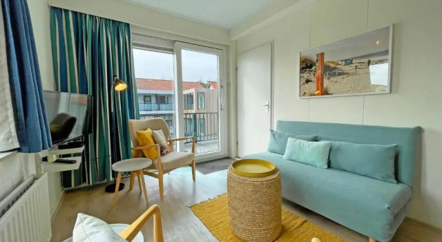 Кровать в общем номере с балконом Appartementen Bos en Duin Texel