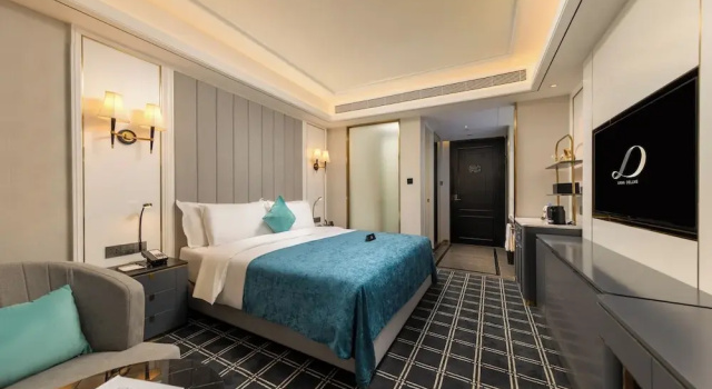 Номер Comfort XANA Deluxe International Hotel Dongshankou Metro Station Branch