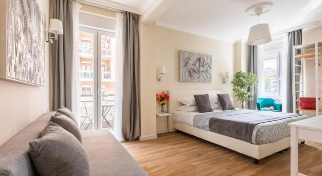 Четырёхместный номер Deluxe Momo Central Rome 1