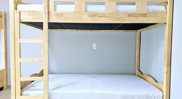 Кровать в общем номере Jeonju Hostel