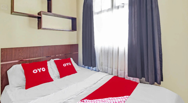 Семейный люкс OYO 90465 Ars Ira Property The Suites Metro