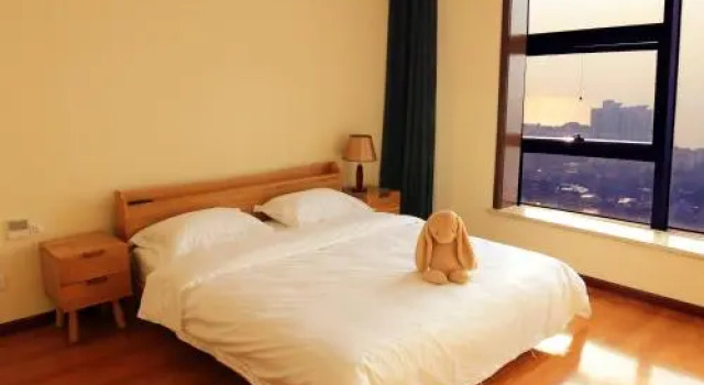 Lidu Hotel Apartment with Sea View (Wusi Square Xianggang Middle Road Shop), Prenota Appartamento Hotel a Shandong con parcheggio, Parcheggio