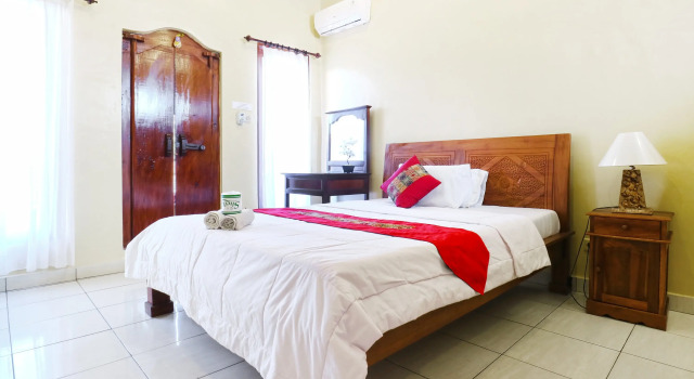Двухместный номер Deluxe с балконом Jungut Guest House Ubud
