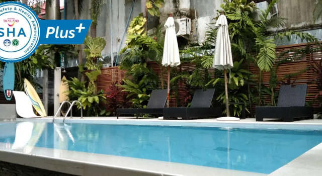 Кровать в общем номере Evergreen Resort