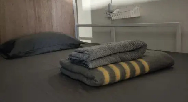 Кровать в общем номере Uni Hostel