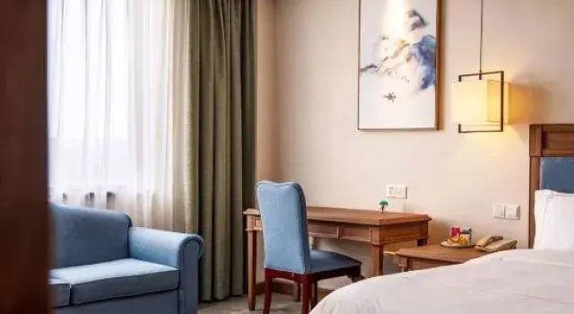 Семейный люкс Executive Huaxin Teckon Xiyue Hotel (Ningbo Fenghua Wanda Plaza Fenghua Intime City)