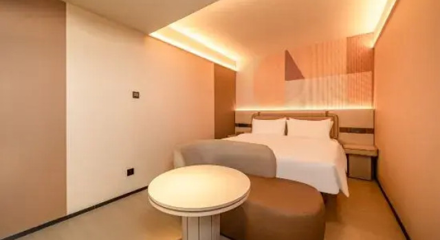 Люкс Business Orange Hotel (Xishuangbanna Jinghong Gelang River Xiangyangshan Branch)