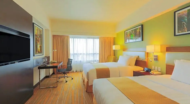 Номер Executive Bright Makati Glass View By GreenBelt