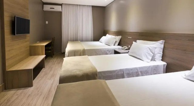 Четырёхместный номер Deluxe Hotel Plaza Camboriú