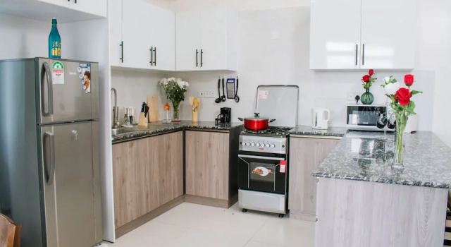 Апартаменты SILVERSTONE APARTMENTS -Modern Living 1 BR NEAR YAYA - GYM&POOL