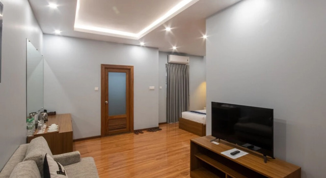 Camera tripla familiare Standard con balcone Regent Hotel