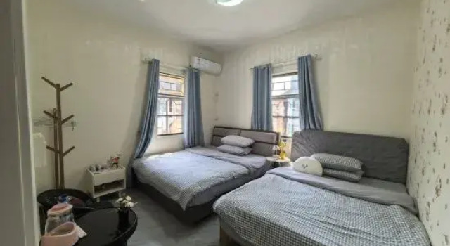 Семейный люкс с 5 комнатами Xinsu Homestay (Judiaosha Yangmeikeng)