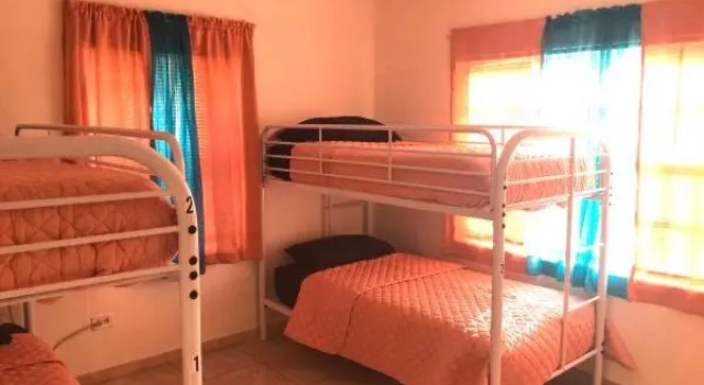 Кровать в общем номере (женский номер) Casa Rosa All Women's Hostel