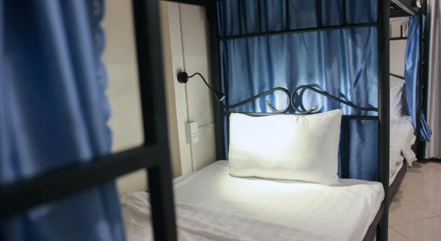 Кровать в общем номере Violet Star Hotel and Spa