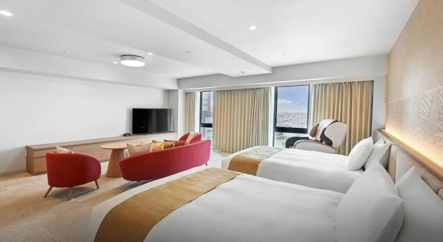 Кровать в общем номере DaiwaRoynetHotelNAHA-OMOROMACHIPREMIER
