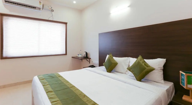 Номер Deluxe Treebo Hi Line Apartments Kalapatti