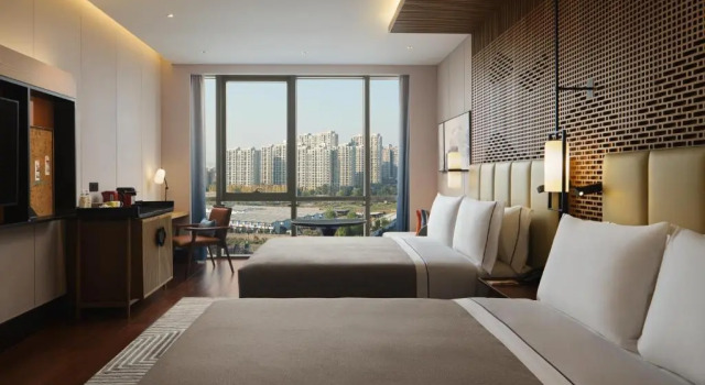 Четырёхместный номер Standard Canopy By Hilton Hangzhou Jinsha Lake