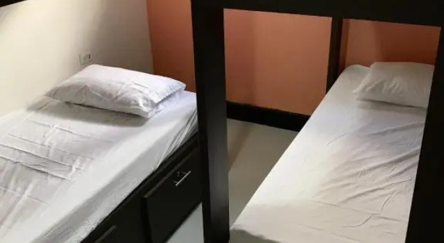 Кровать в общем номере La Quinta Bacana