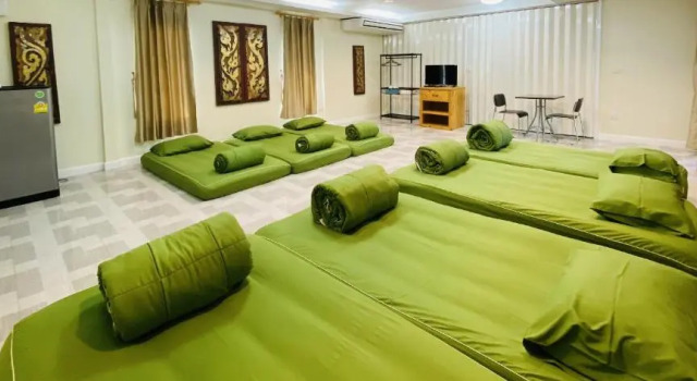 Кровать в общем номере Panutsaya Homestay
