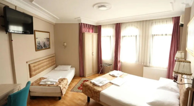 Трёхместный номер Standard Tashkonak Studio Suites