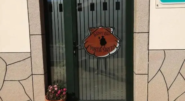 Кровать в общем номере Albergue Pension Porta Santa