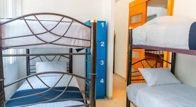 Кровать в общем номере Hostal Talavera