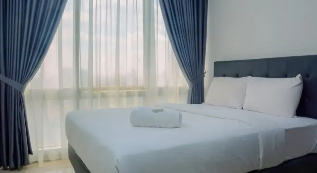 Номер Standard Comfy and Spacious 2BR The Masterpiece Epicentrum Apartment By Travelio