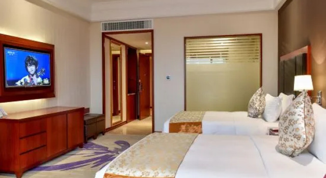O podwyższonym standardzie pokój Ramada Plaza Chibi