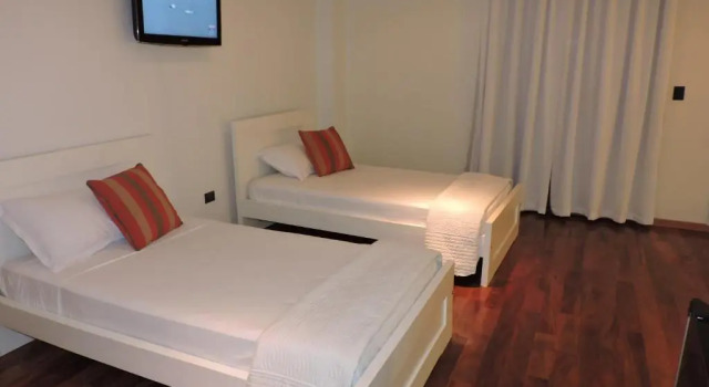 Четырёхместный номер Classic с балконом и с красивым видом из окна Patio del Puerto Hotel Boutique