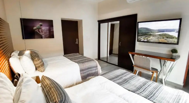 Четырёхместный номер Superior Hotel Plaza Cuatro Ciénegas