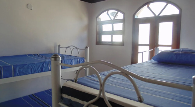 Кровать в общем номере Hostel Praia Brava