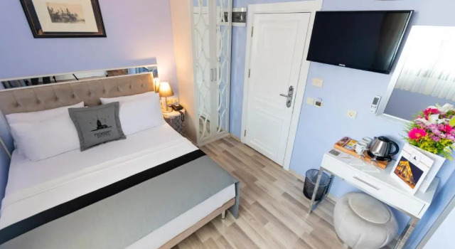 Четырёхместный номер Primero Hotel