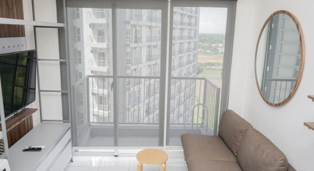 Апартаменты Premium Relaxing 2BR at Casa de Parco Apartment