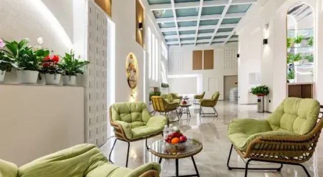 Mangshi Mango Fragrance & Beauty Homestay Hotel, Buchen Sie Hotel Hotels in Yunnan mit Parkplatz, Parkplätze