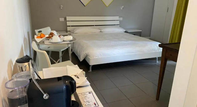 Двухместный номер Standard с балконом B&B WarmUp Grosseto - Parcheggio incluso nella corte interna