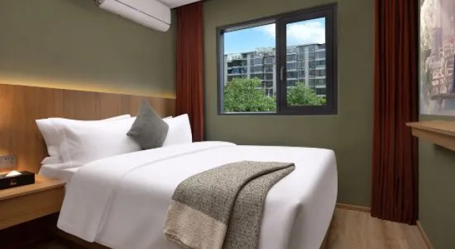 Двухместный семейный люкс с 2 комнатами Chema Slow Hotel (Xingsha Zhongmaocheng)