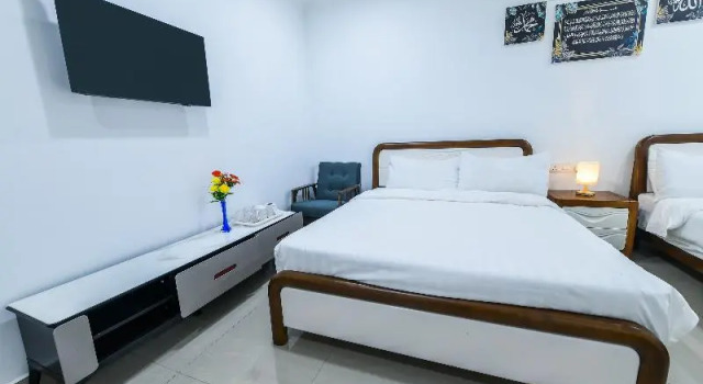 Четырёхместный люкс Capital O 90543 Sp Star Hotel