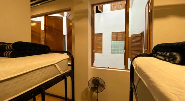 Кровать в общем номере Hostel Mundo Joven Catedral