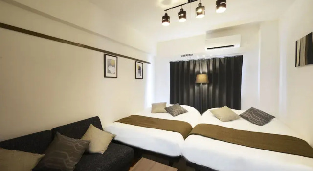 Четырёхместный номер Luxury Goya OKINAWA SUITES