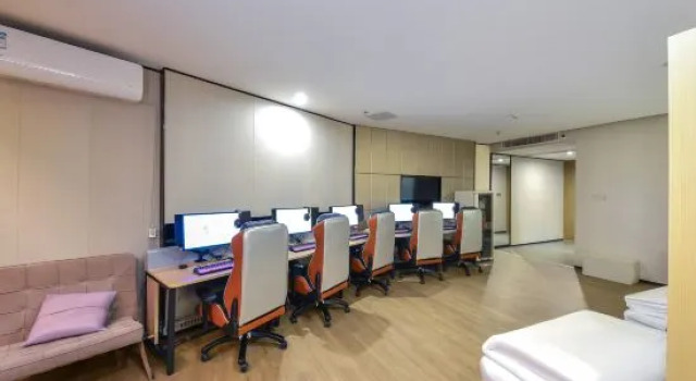 Кровать в общем номере WanYoo Esports Hotel (Foshan Ancestral Temple Creative Industry Park)