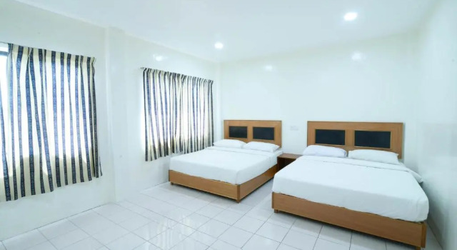 Standardowy czteroosobowy pokój mersing hotel