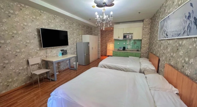 Четырёхместный номер Comfort Tiandi Huadian Apartment Youlehui