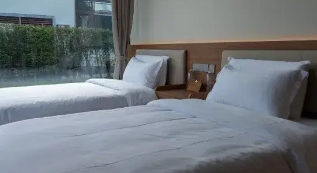 Семейный люкс с 2 комнатами Shuaiwa Club Homestay (Shanghai Jinshan North Station Huakai Seaside Ecological Park)
