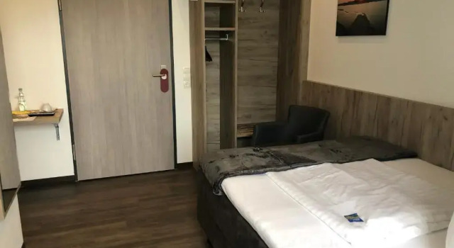 Апартаменты Hotel Am Stadtpark