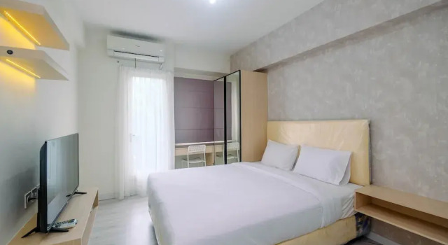 Номер Standard Graceful Studio Room At Podomoro Golf View Apartment By Travelio