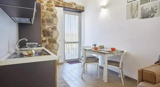 Апартаменты Цокольный этаж Casale Sammartano - Appartamenti con piscina comune