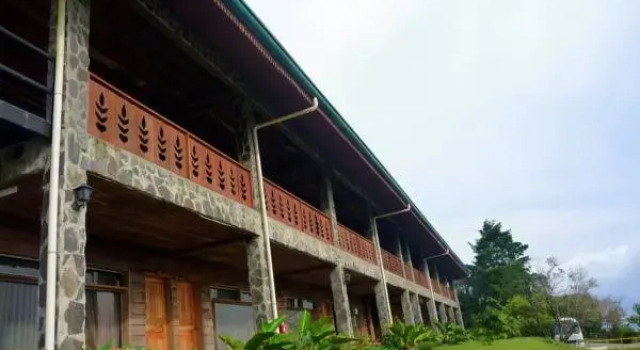 Кровать в общем номере Hotel Heliconia - Monteverde