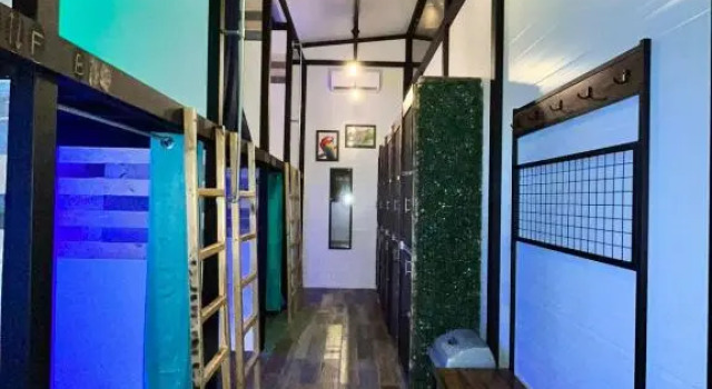Кровать в общем номере Tucan Hotel
